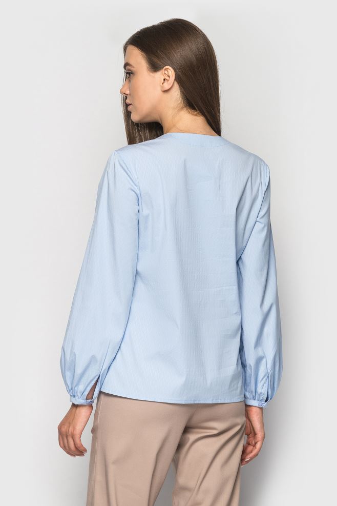 Блакитна блуза з нависними петлями з італійської бавовни